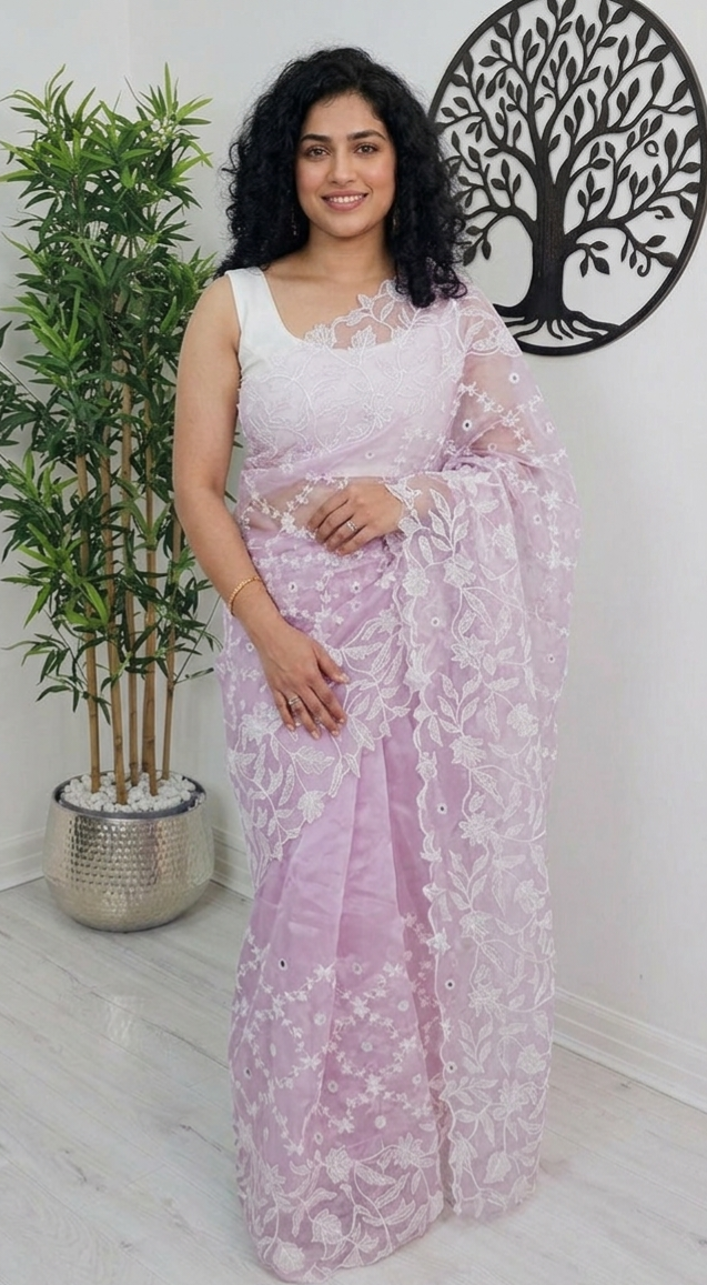 Beautiful embroidered and scalloped  organza saree
