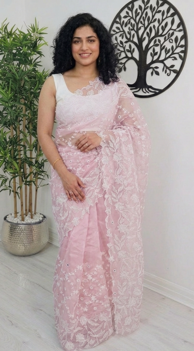 Beautiful embroidered and scalloped  organza saree