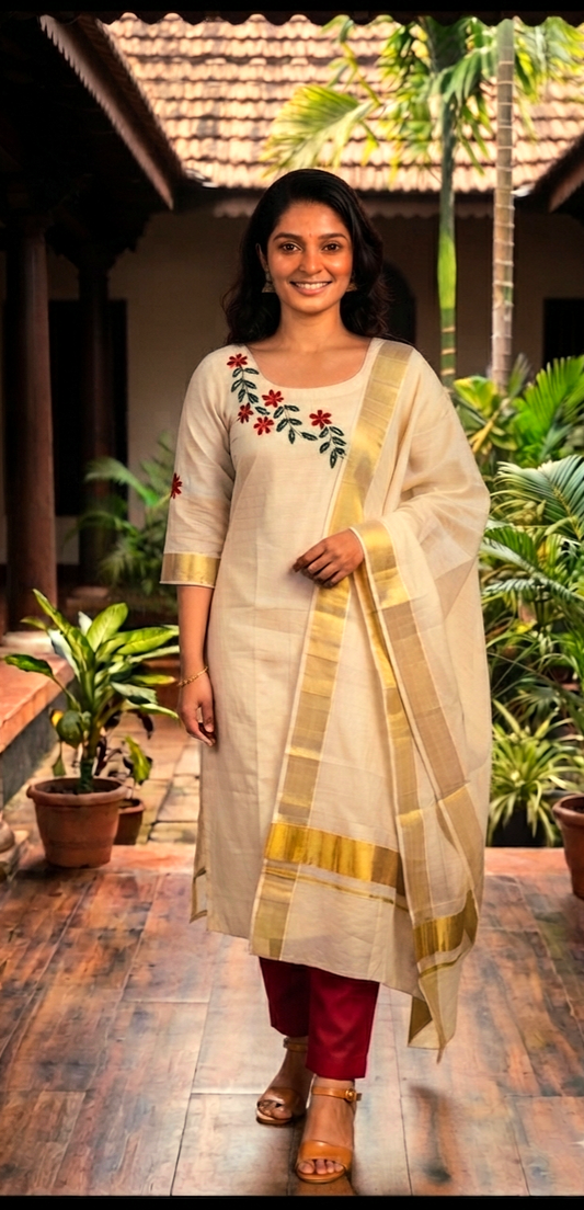 Beautiful embroidered Tissue Onam three piece suit
