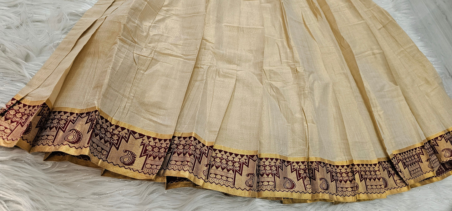 Soft silk dhavani paired with a ready-to-wear maroon blouse