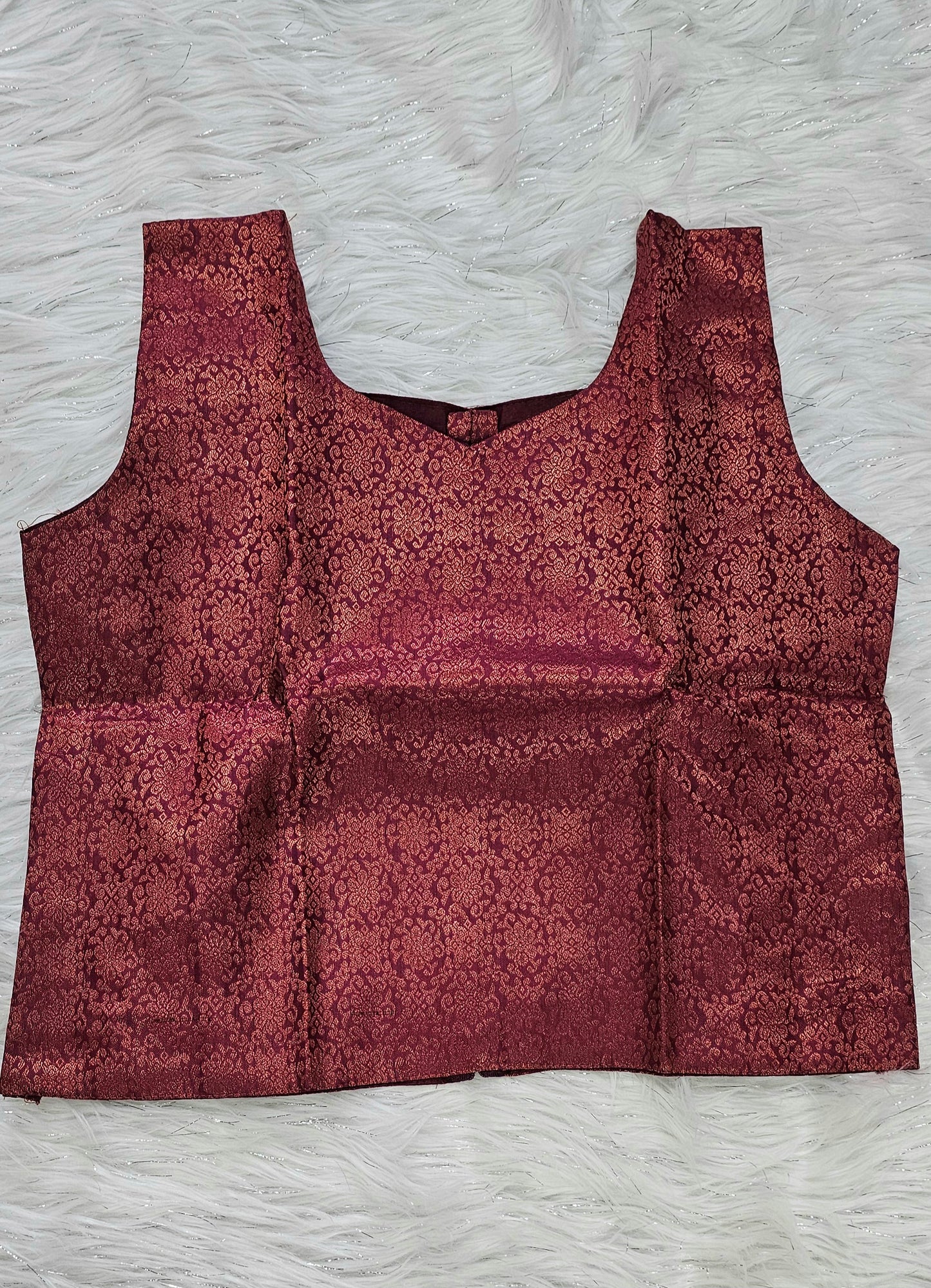 Soft silk dhavani paired with a ready-to-wear maroon blouse