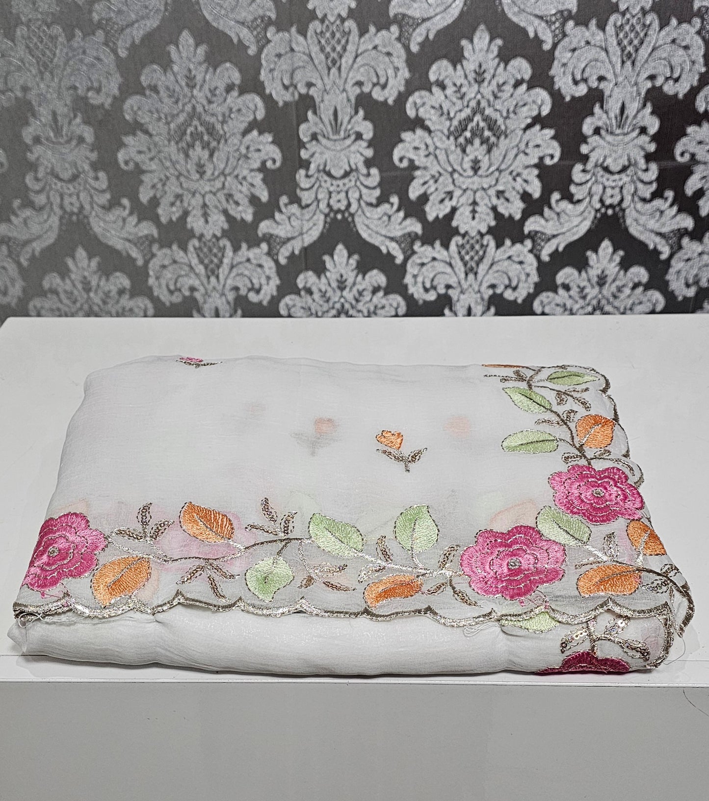 Beautiful embroidered crushed silk saree