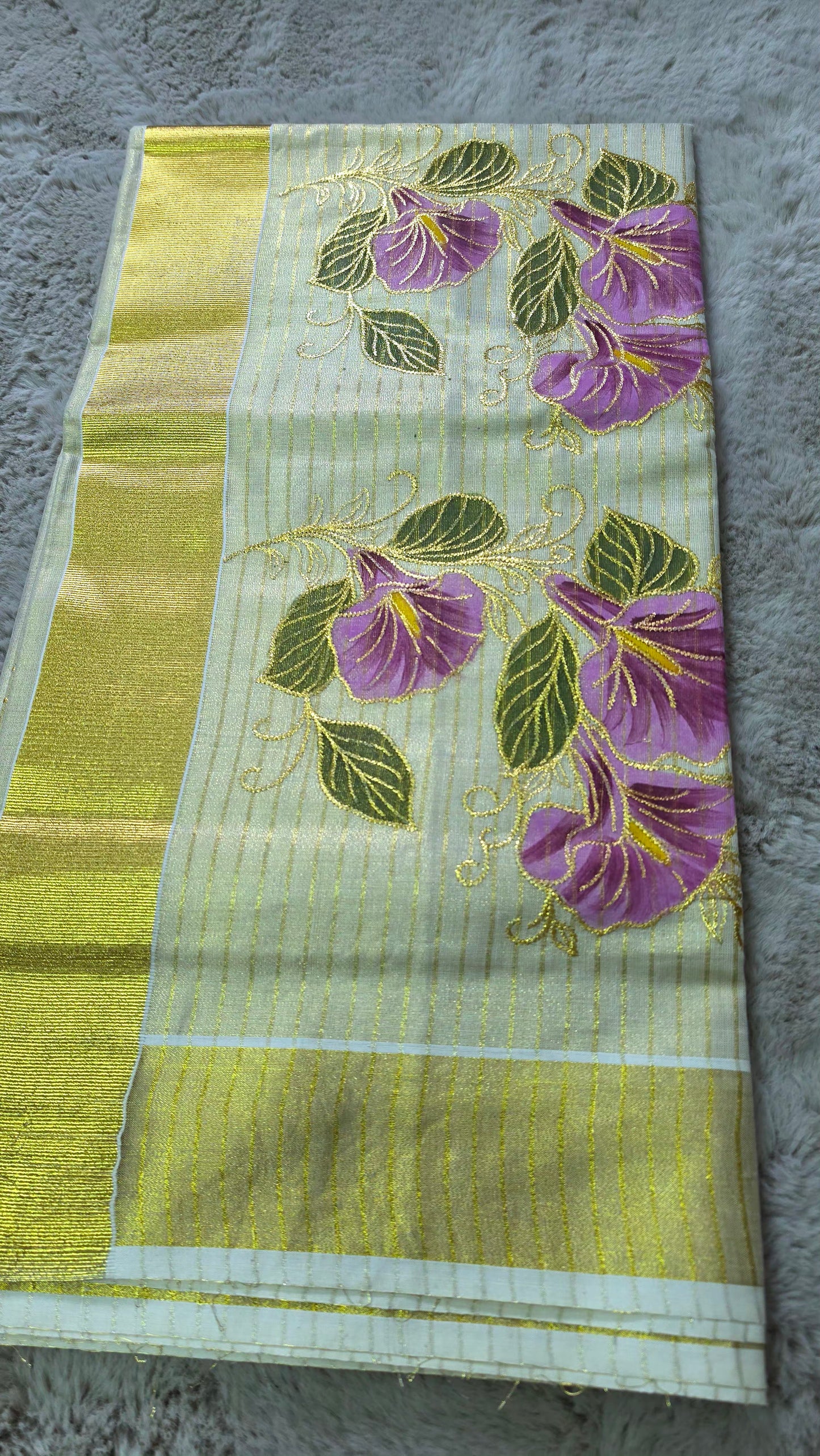 Beautiful embroidered  tissue set saree with blouse