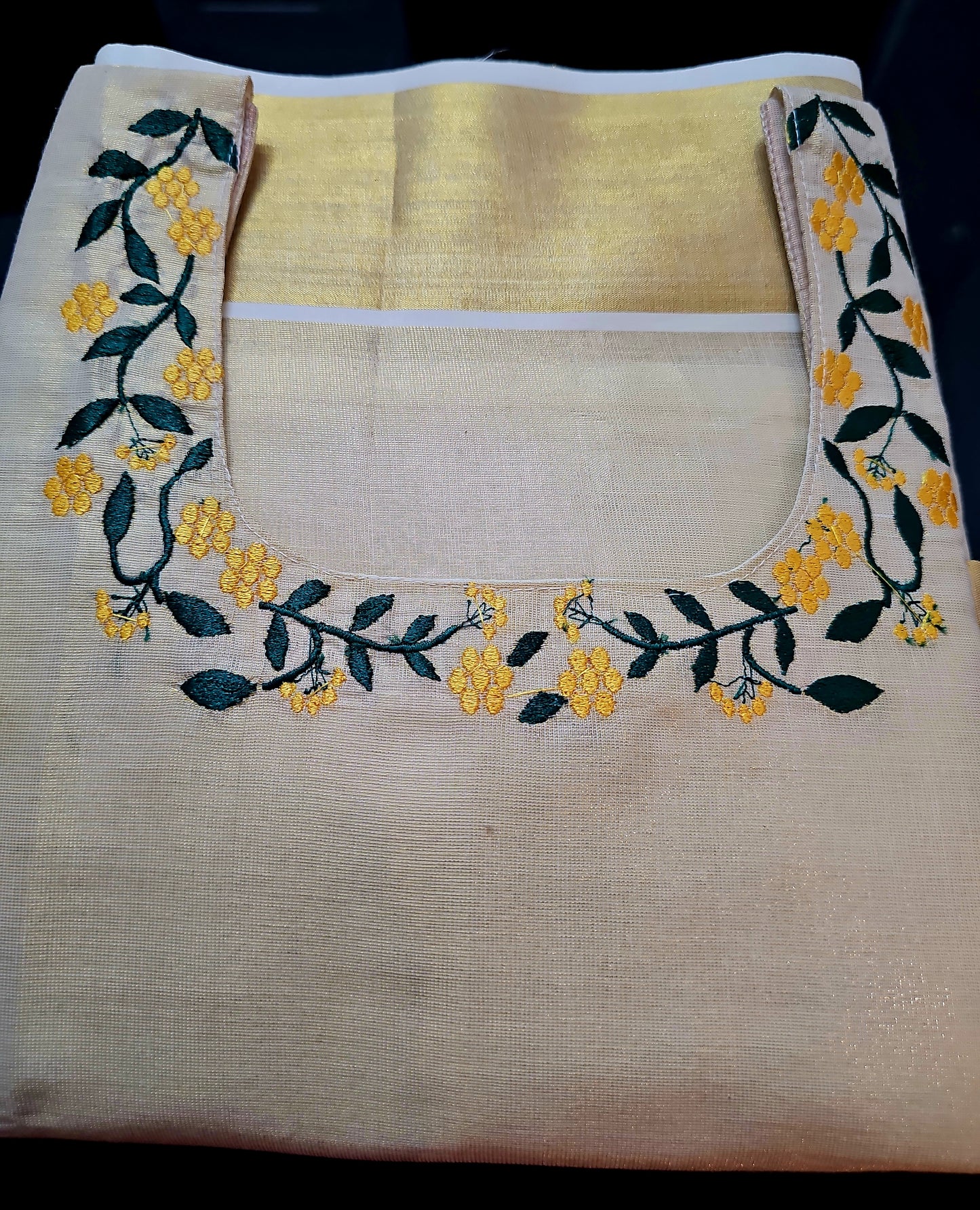 Beautiful embroidered Onam tissue three piece salwar suit