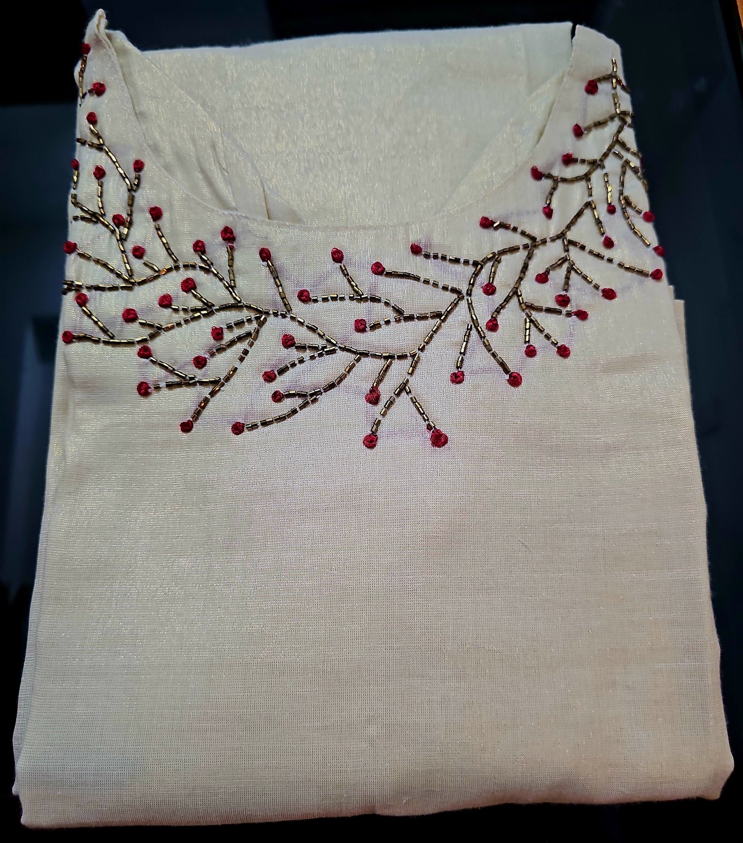 Beautiful hand worked Onam tissue three piece suit
