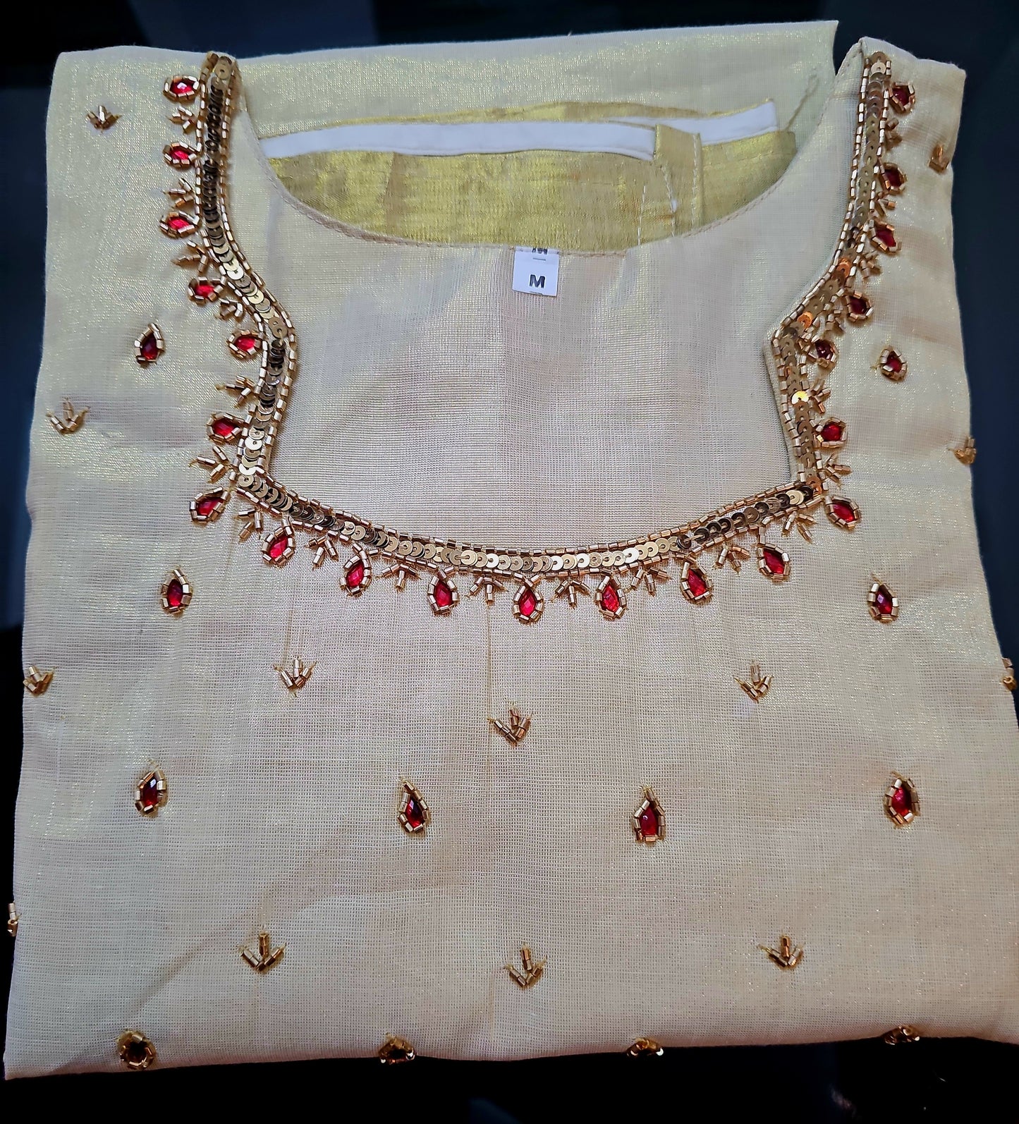 Beautiful hand worked Onam tissue three piece suit