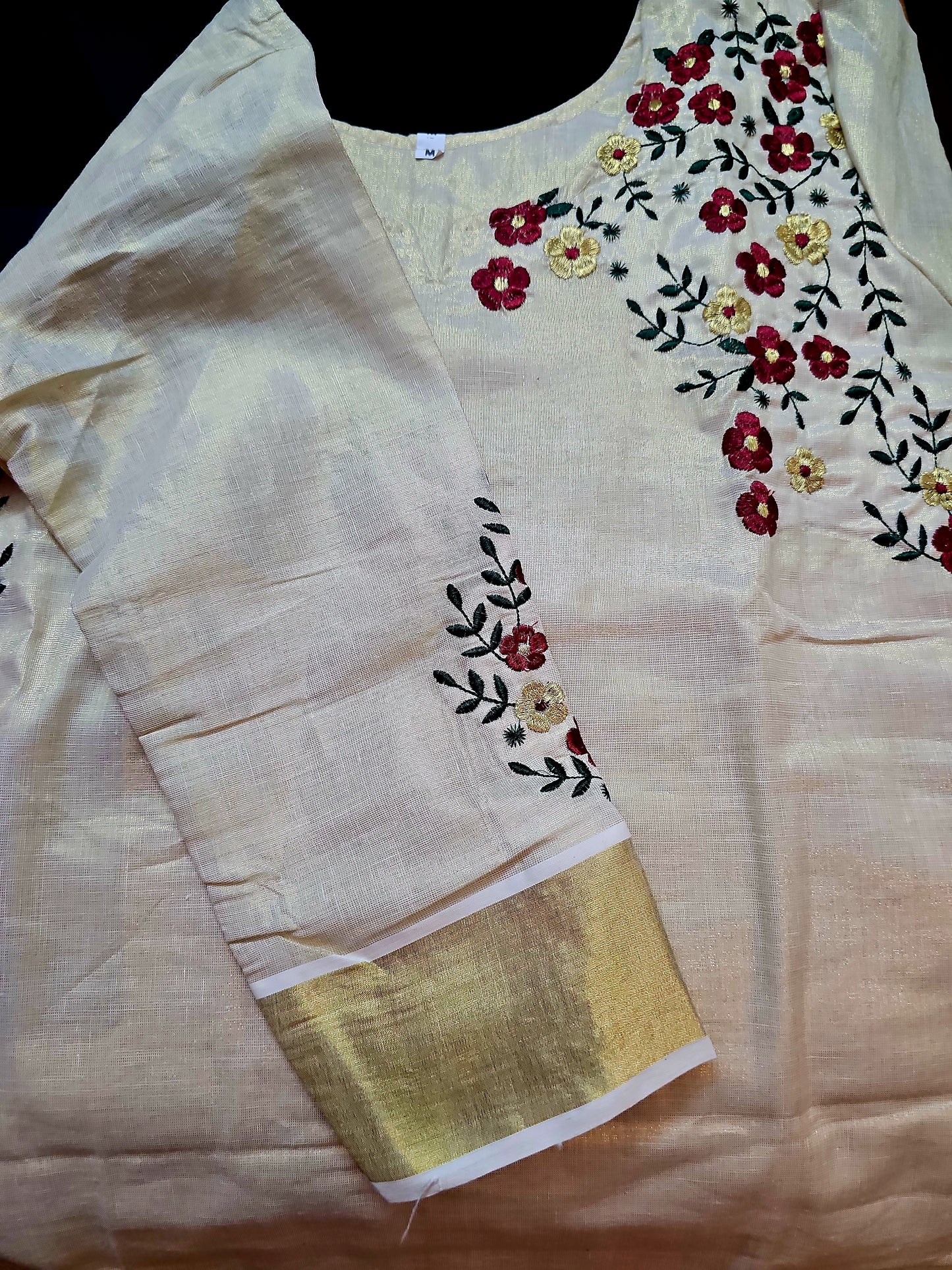Beautiful embroidered Onam tissue three piece suit