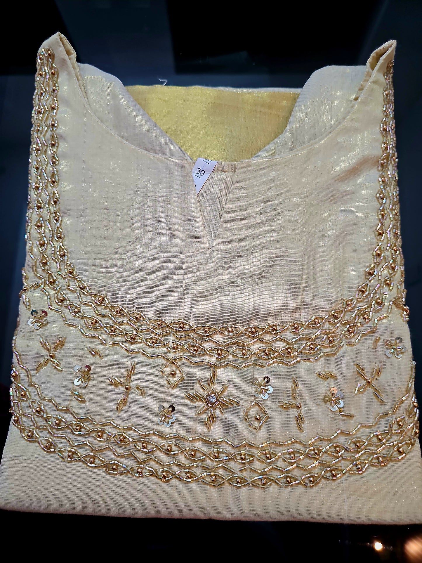 Beautiful hand worked Onam tissue three piece suit