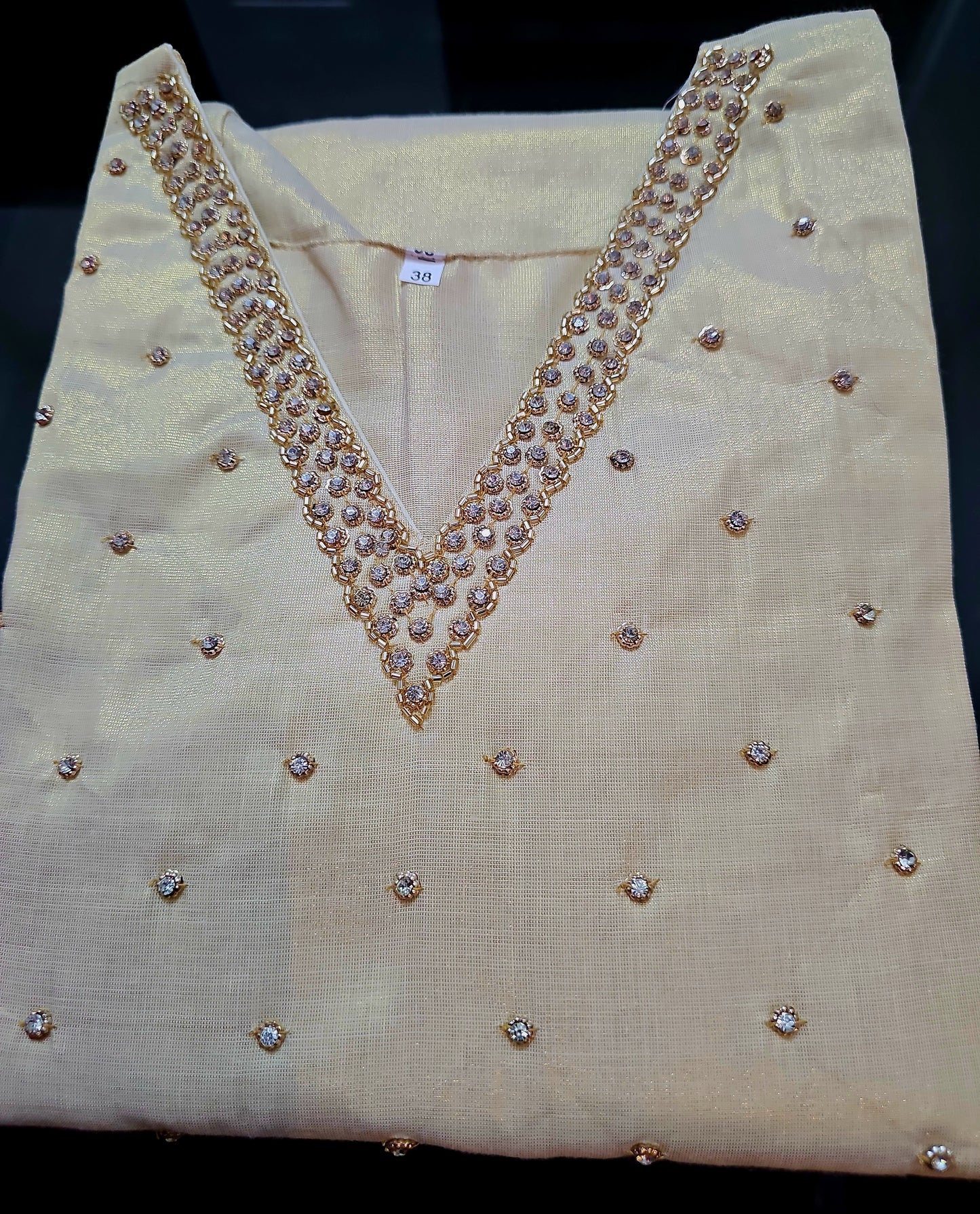 Beautiful hand worked Onam tissue three piece suit