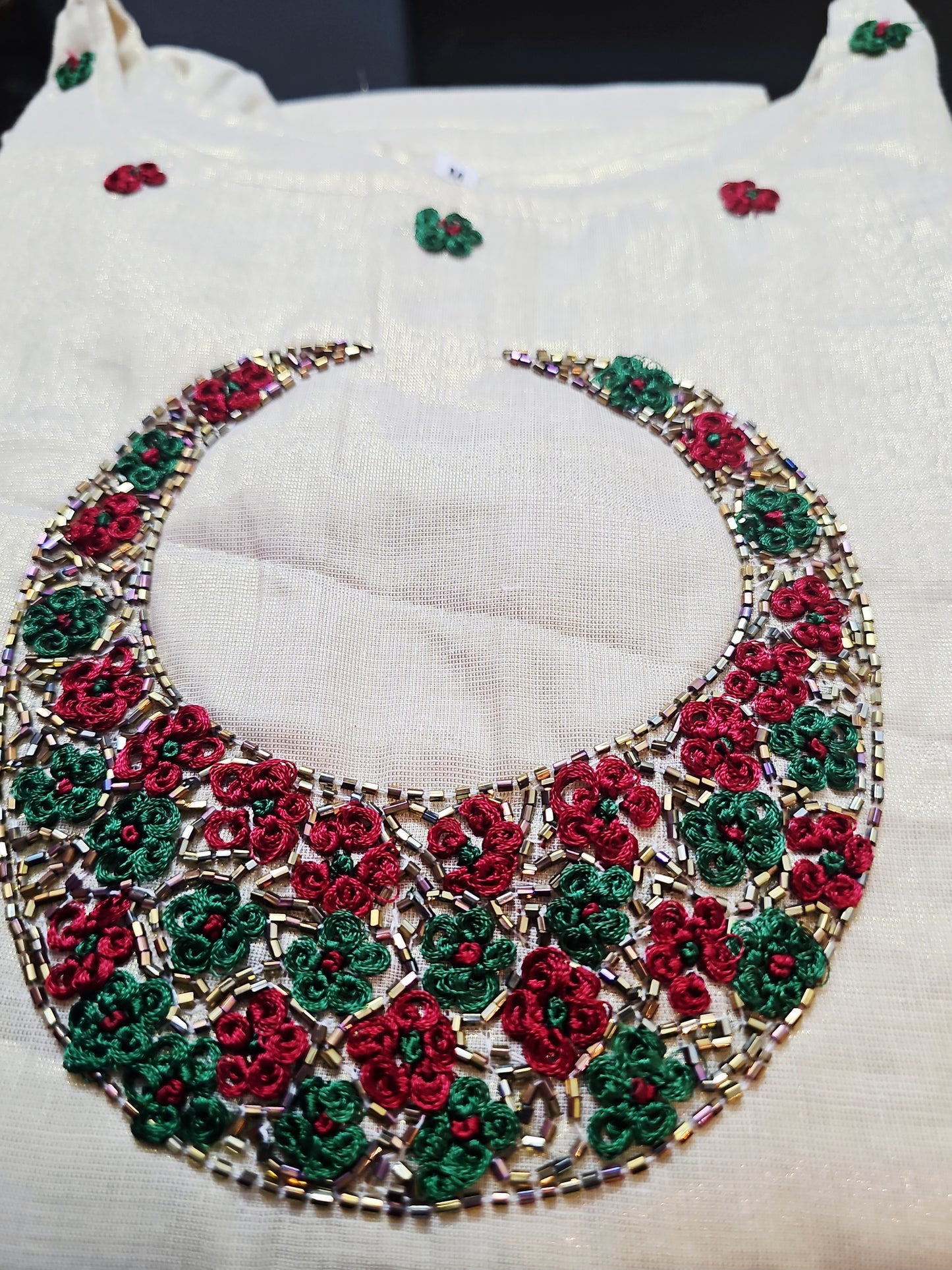 Beautiful hand worked Onam tissue three piece suit