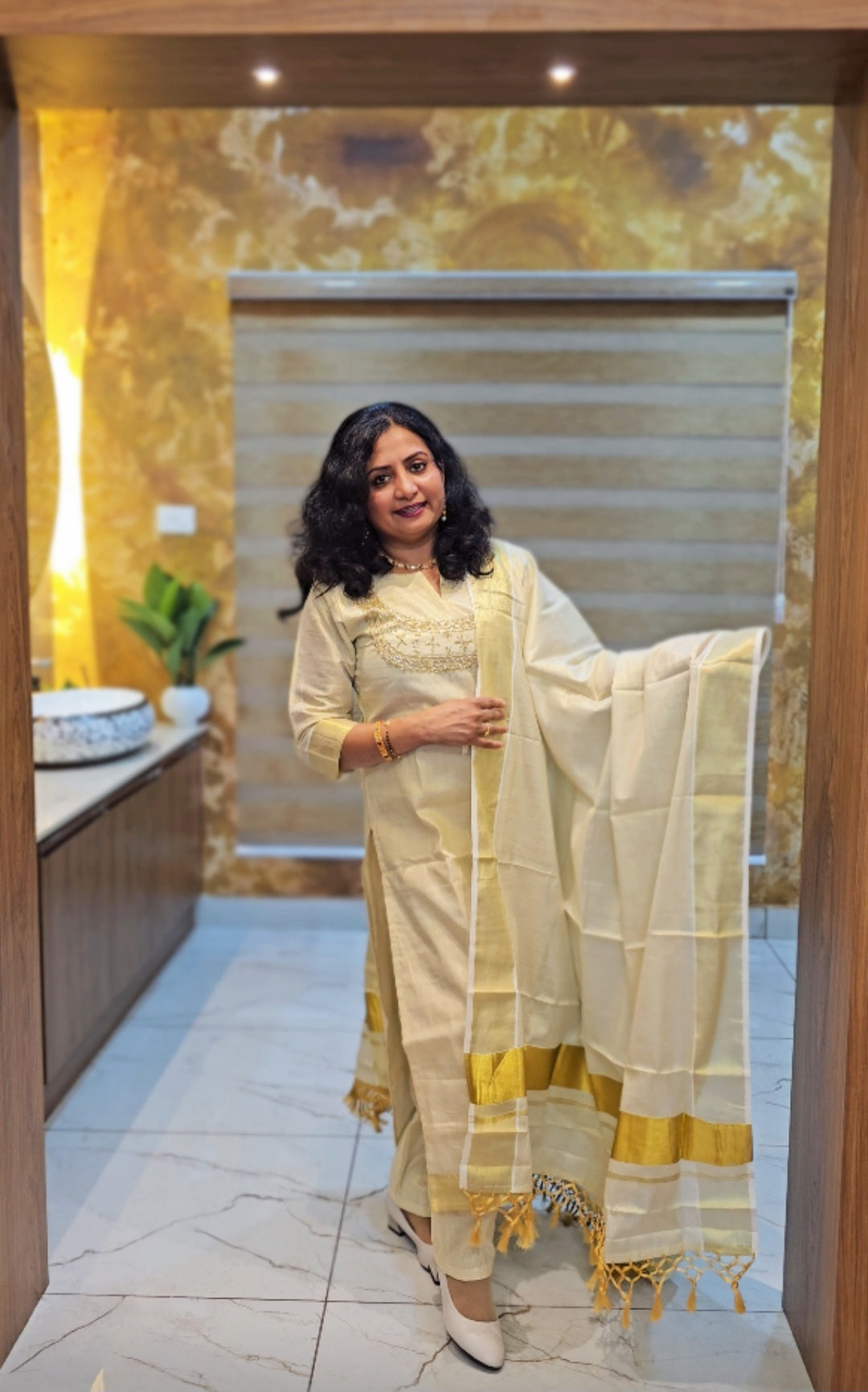 Beautiful hand worked Onam tissue three piece suit