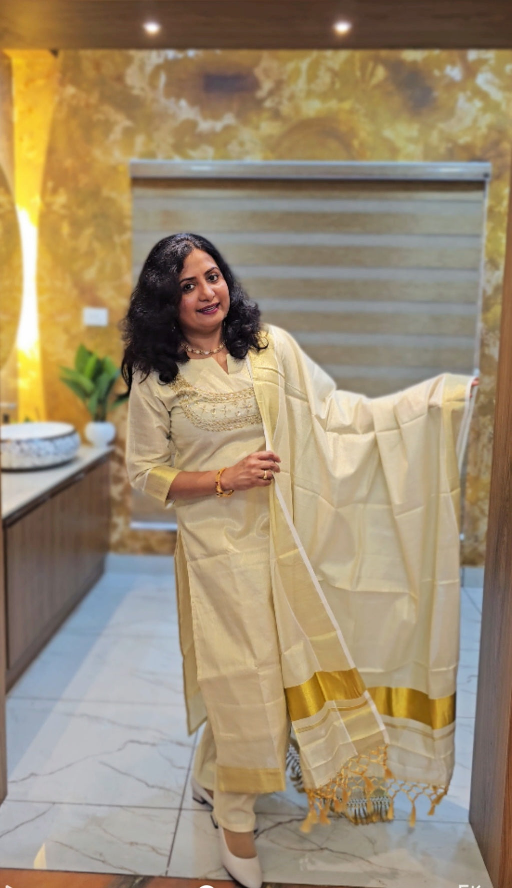 Beautiful hand worked Onam tissue three piece suit