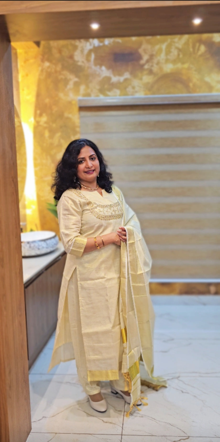 Beautiful hand worked Onam tissue three piece suit