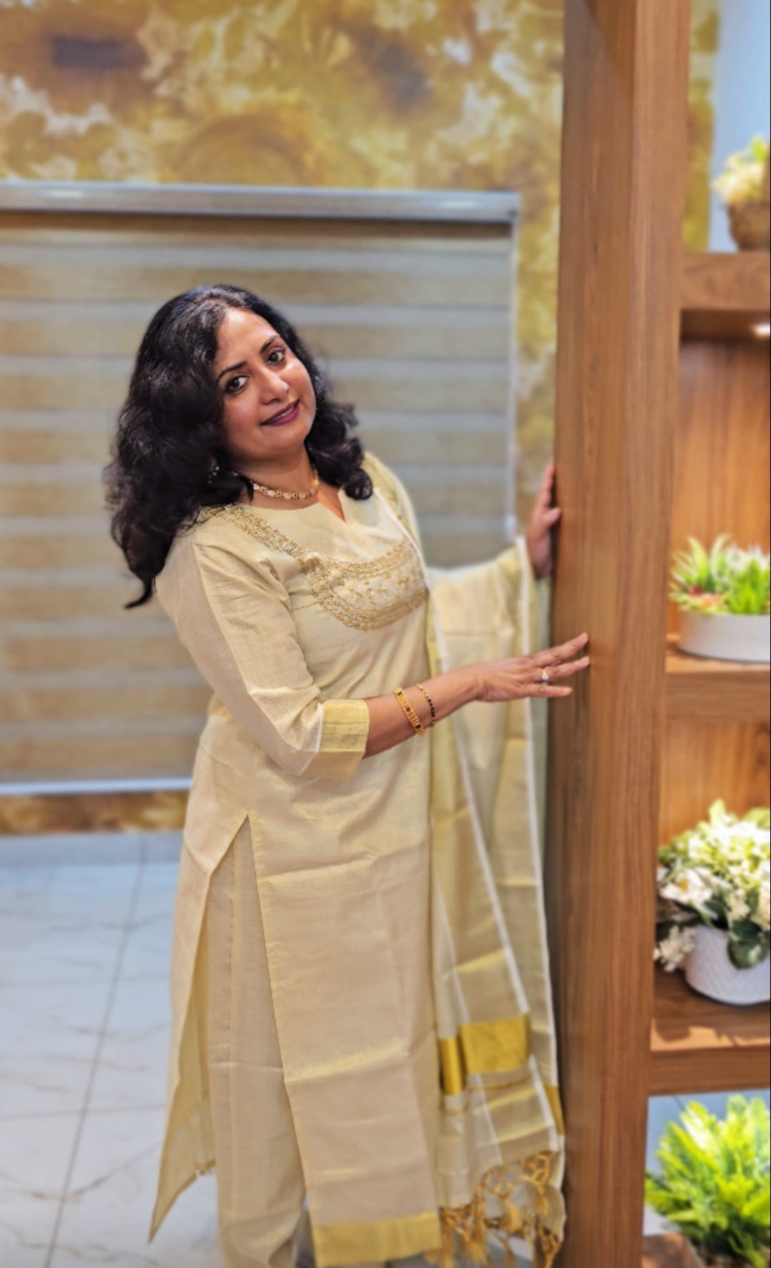 Beautiful hand worked Onam tissue three piece suit