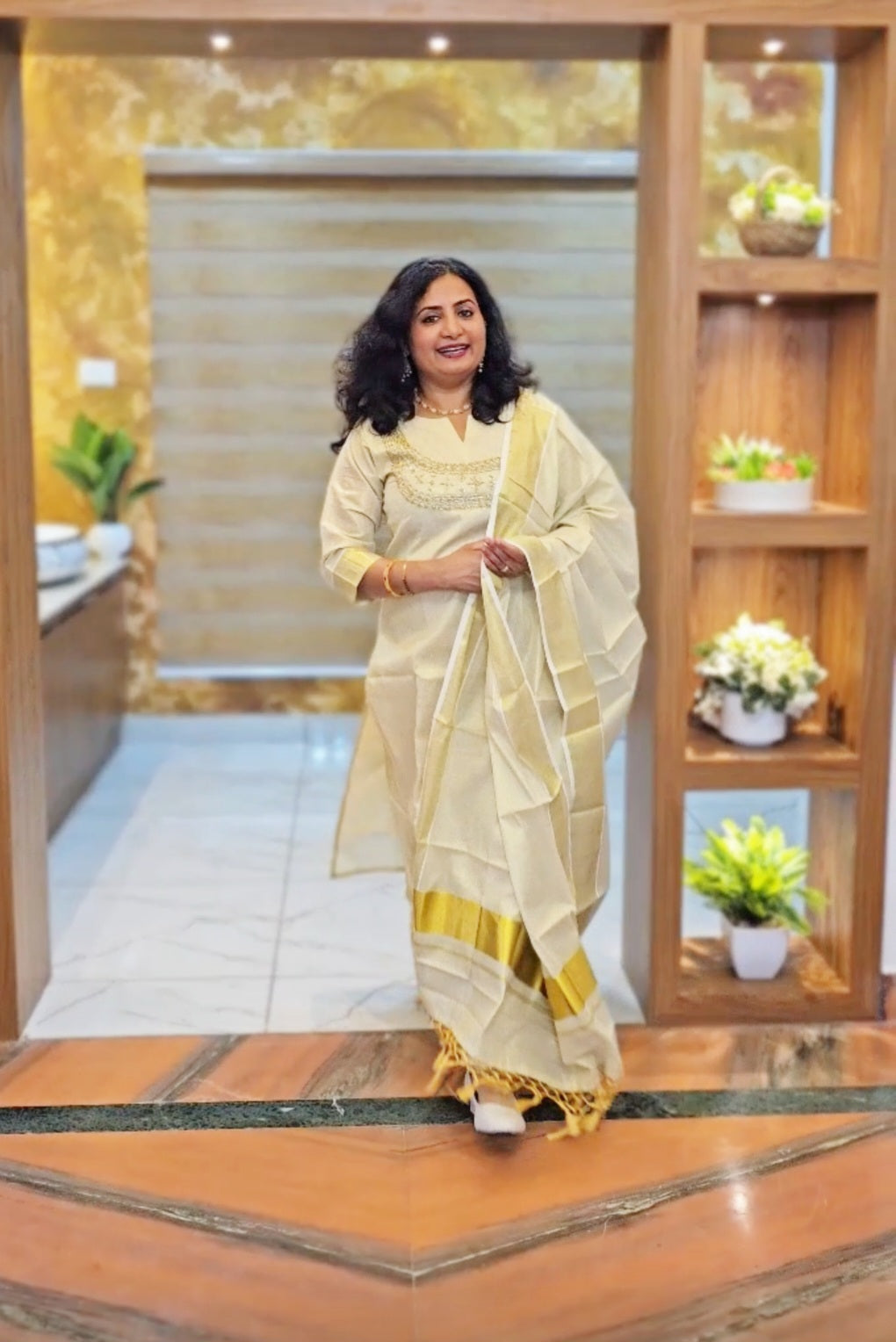 Beautiful hand worked Onam tissue three piece suit