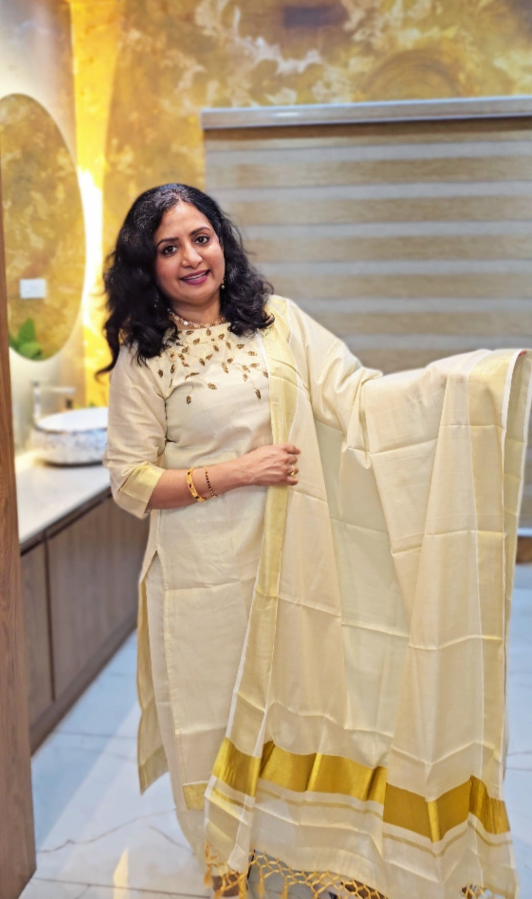 Beautiful hand worked Onam tissue three piece suit