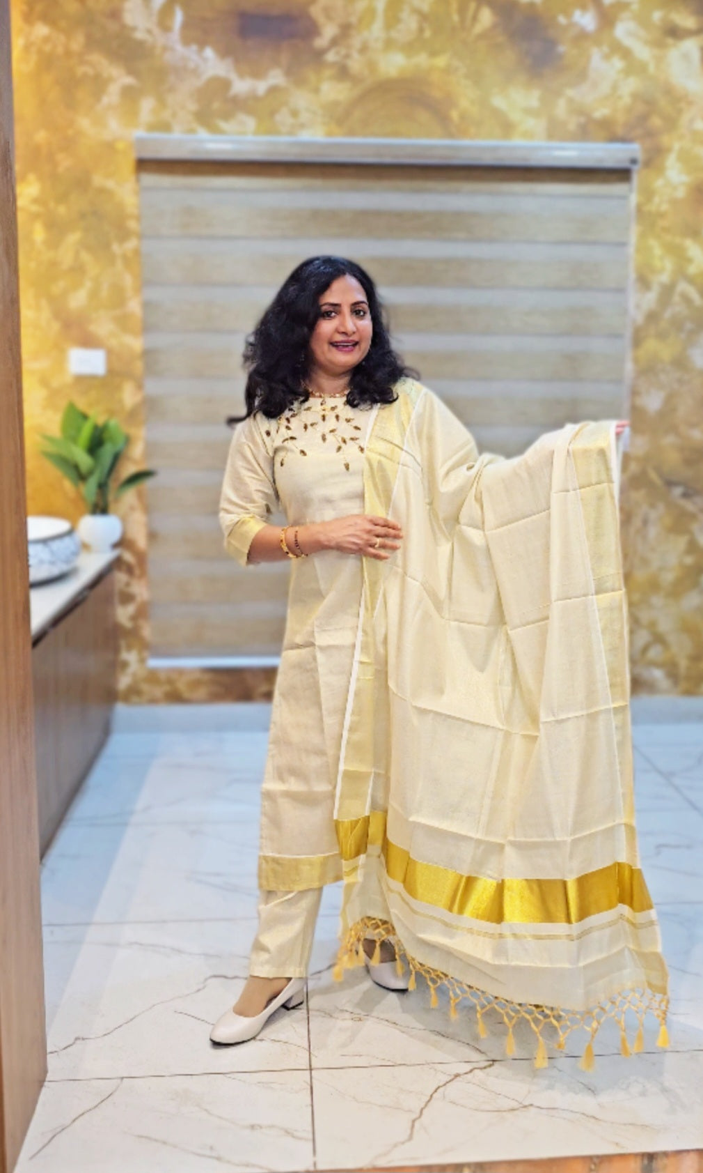 Beautiful hand worked Onam tissue three piece suit