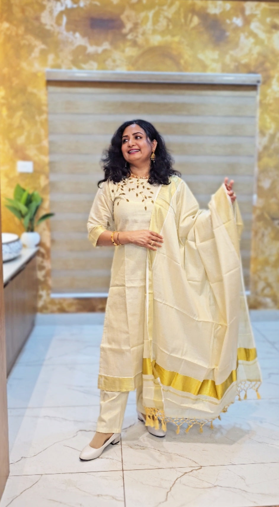Beautiful hand worked Onam tissue three piece suit