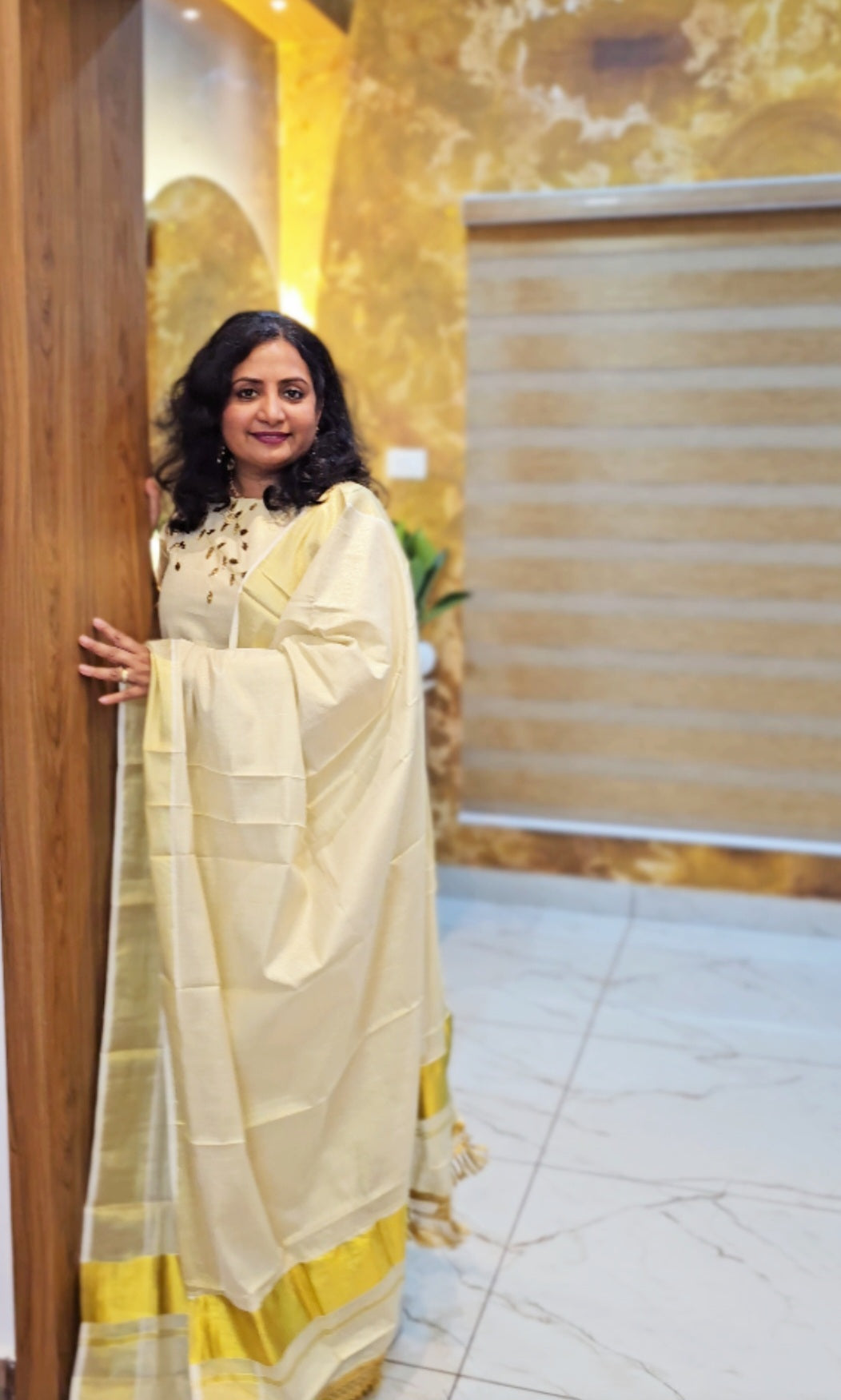 Beautiful hand worked Onam tissue three piece suit