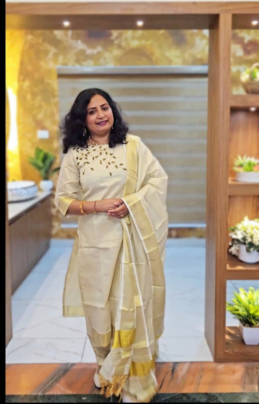 Beautiful hand worked Onam tissue three piece suit