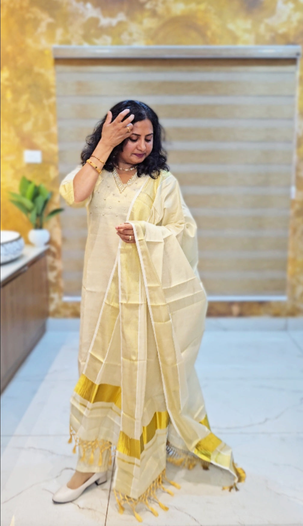 Beautiful hand worked Onam tissue three piece suit