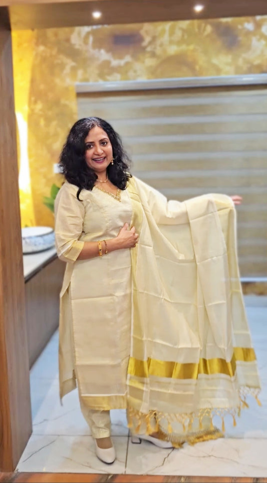 Beautiful hand worked Onam tissue three piece suit