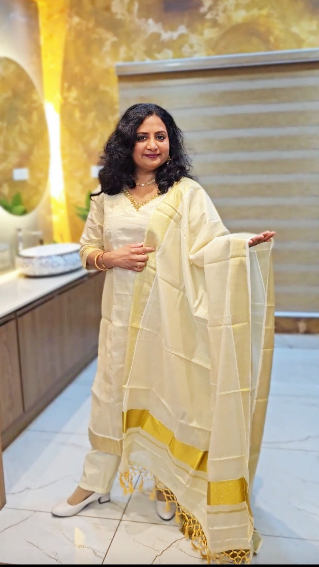 Beautiful hand worked Onam tissue three piece suit