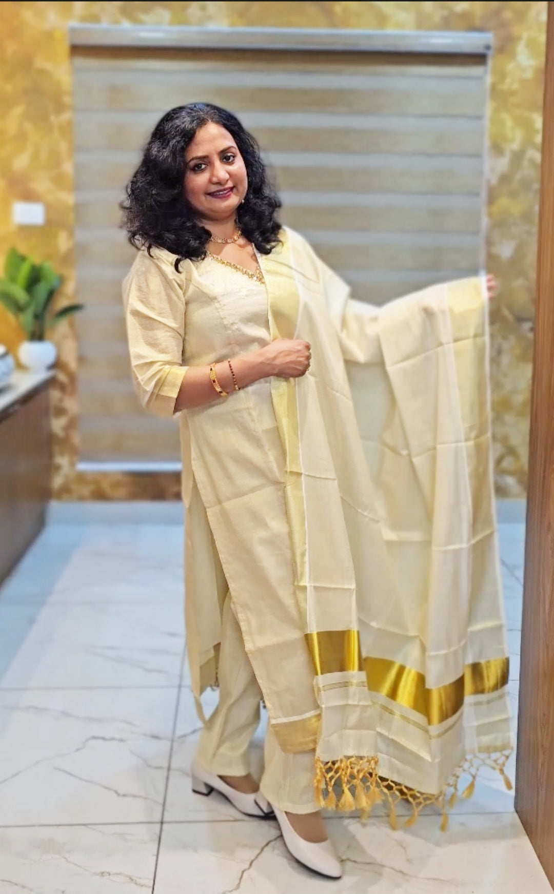 Beautiful hand worked Onam tissue three piece suit