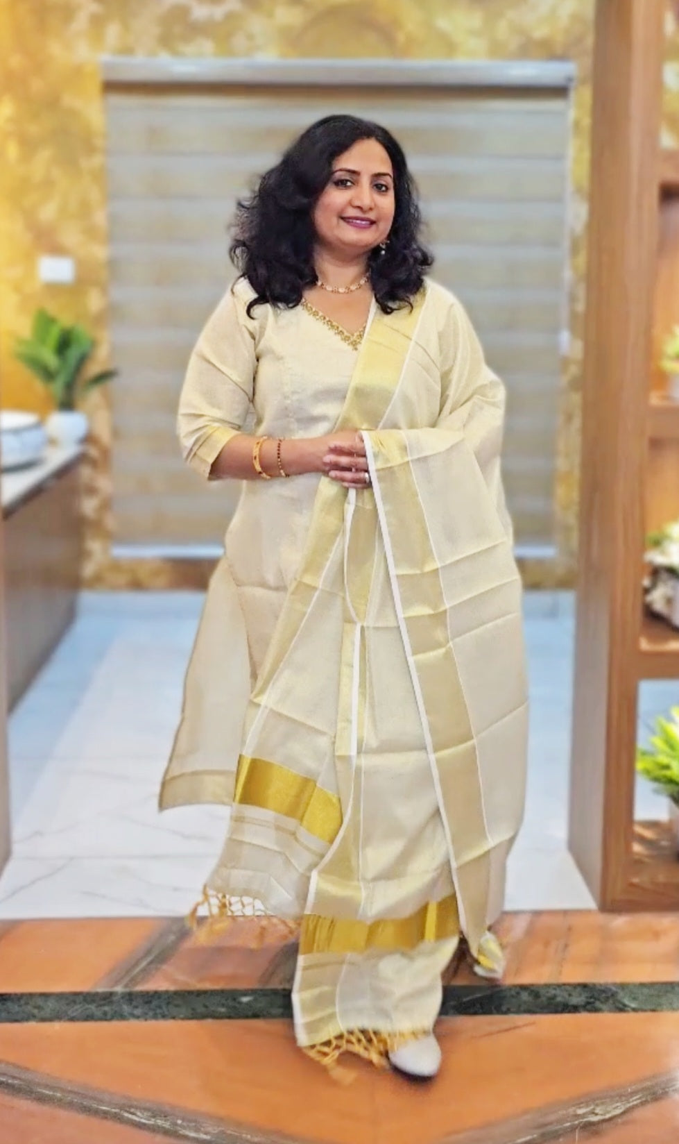 Beautiful hand worked Onam tissue three piece suit