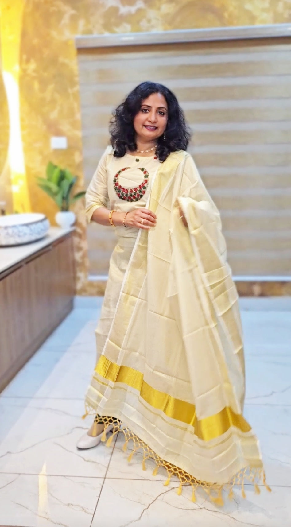 Beautiful hand worked Onam tissue three piece suit