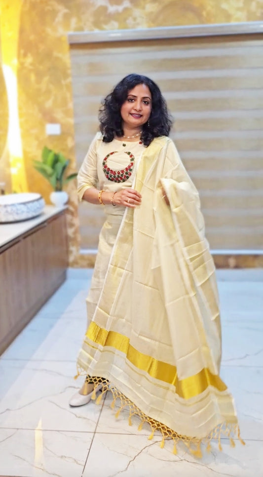 Beautiful hand worked Onam tissue three piece suit