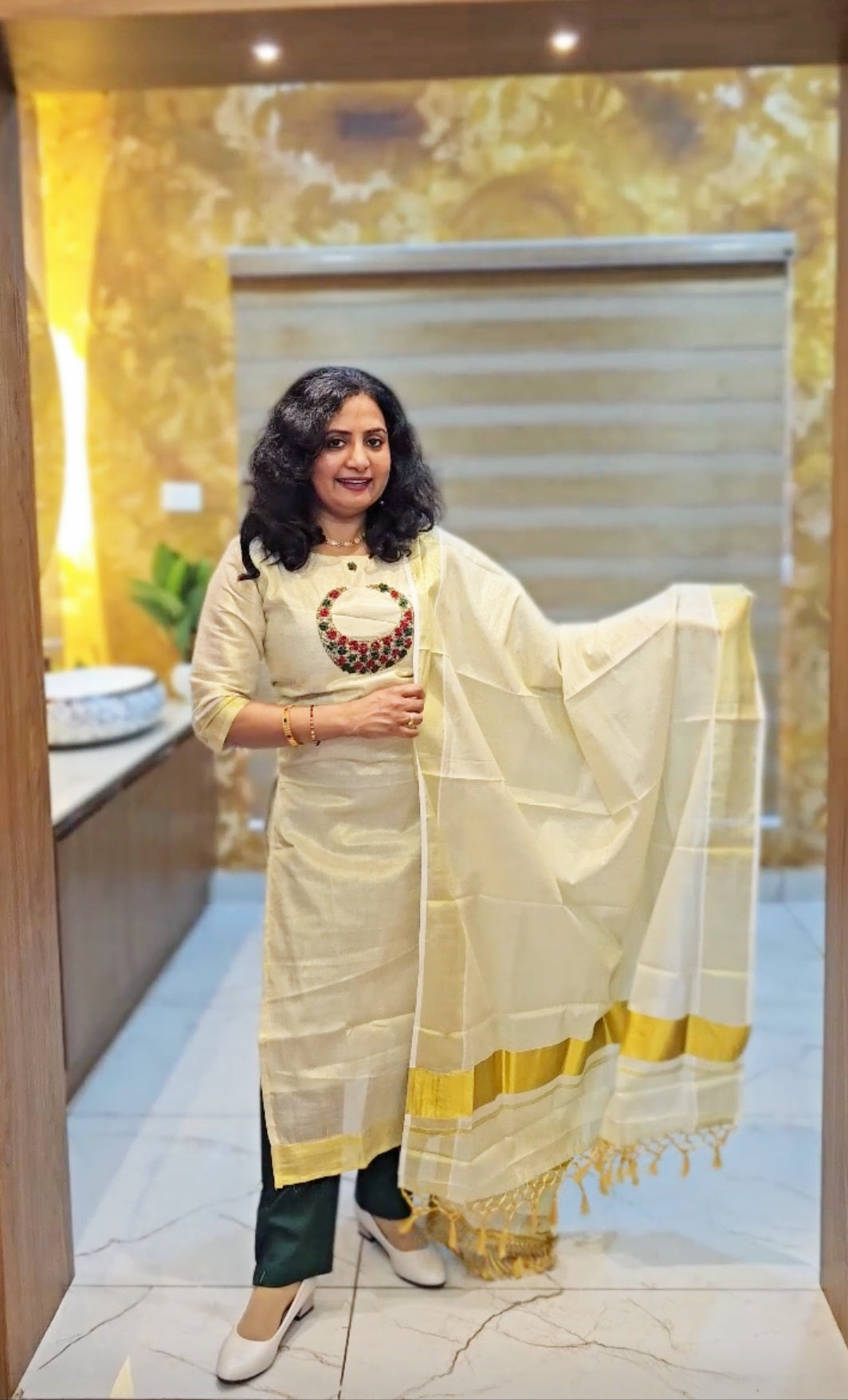 Beautiful hand worked Onam tissue three piece suit