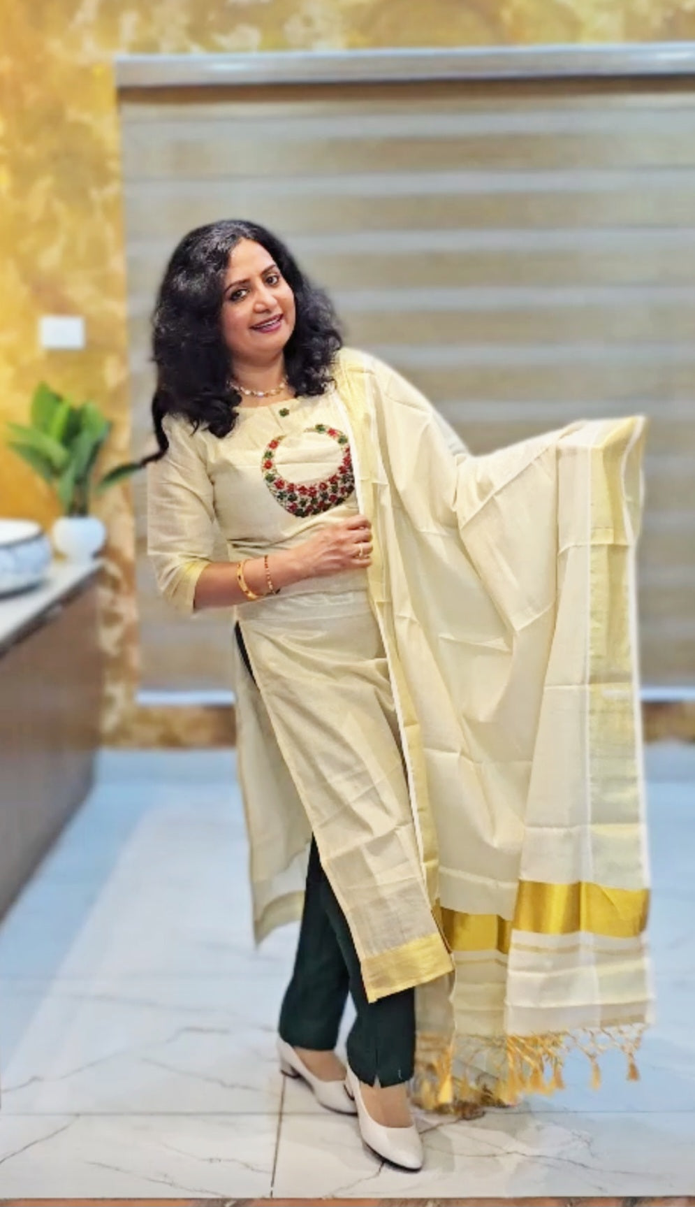 Beautiful hand worked Onam tissue three piece suit
