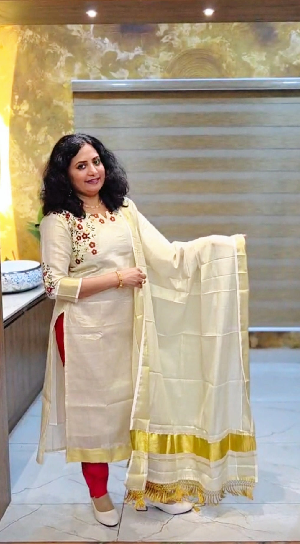 Beautiful embroidered Onam tissue three piece suit