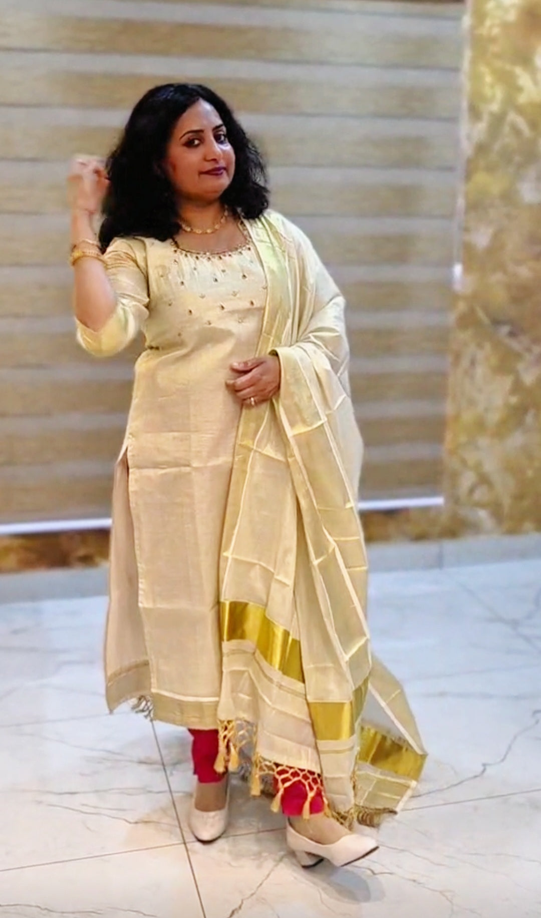 Beautiful hand worked Onam tissue three piece suit