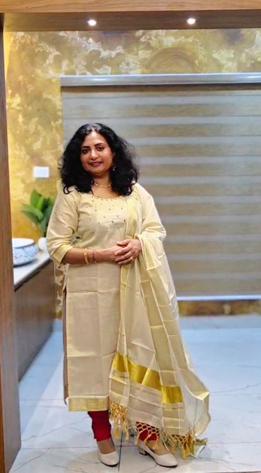 Beautiful hand worked Onam tissue three piece suit