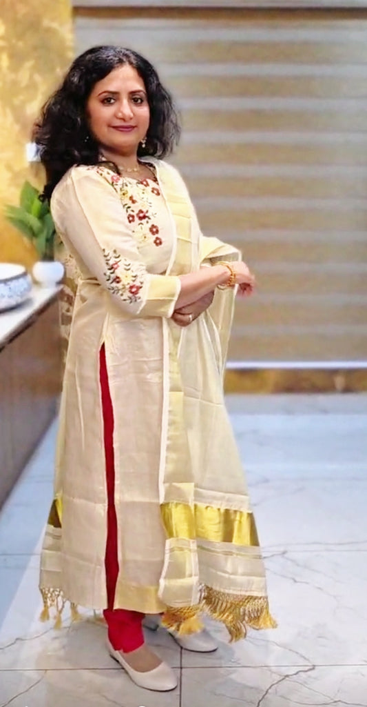 Beautiful hand worked Onam tissue three piece suit