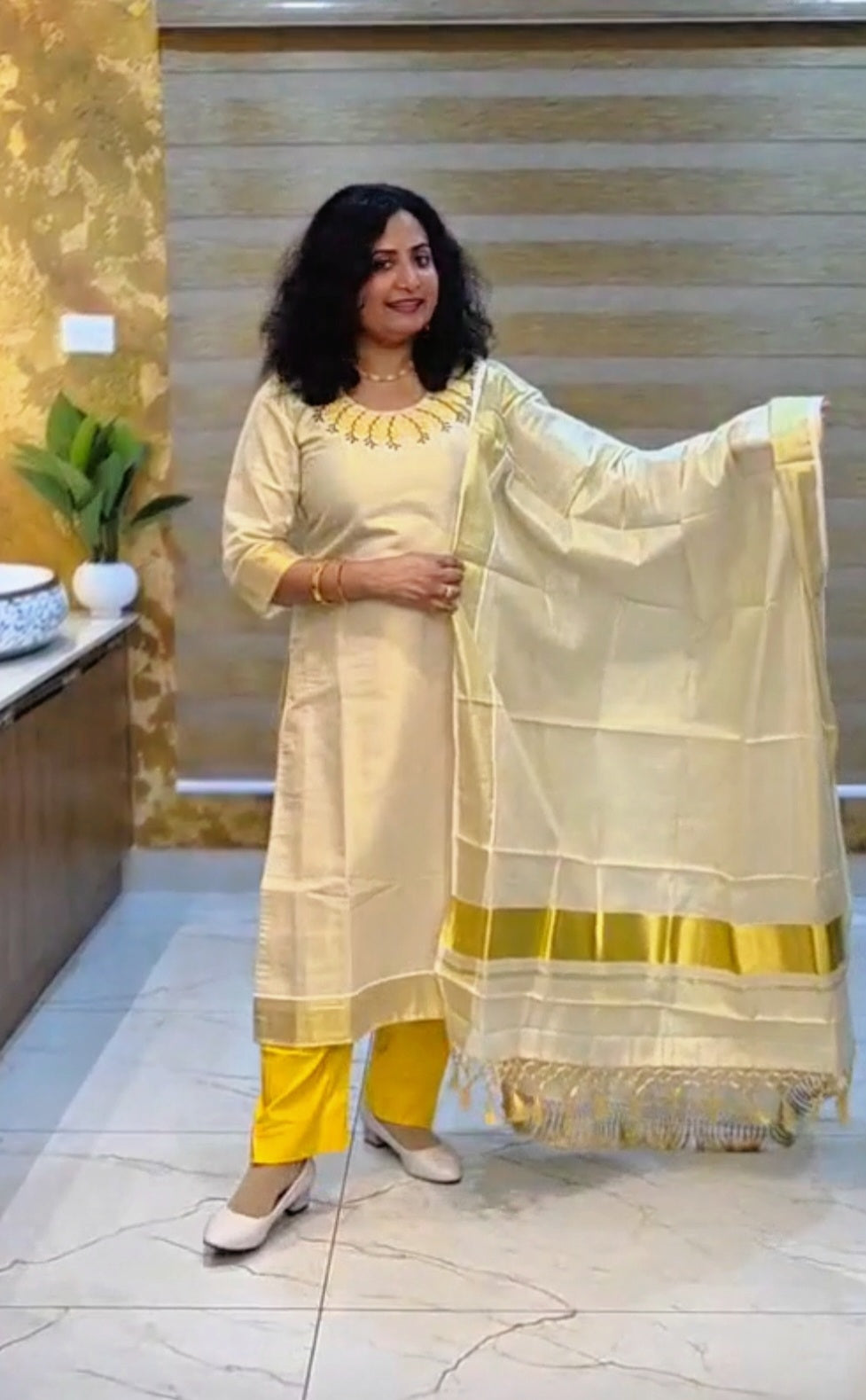 Embroidered Tissue Onam three piece suit