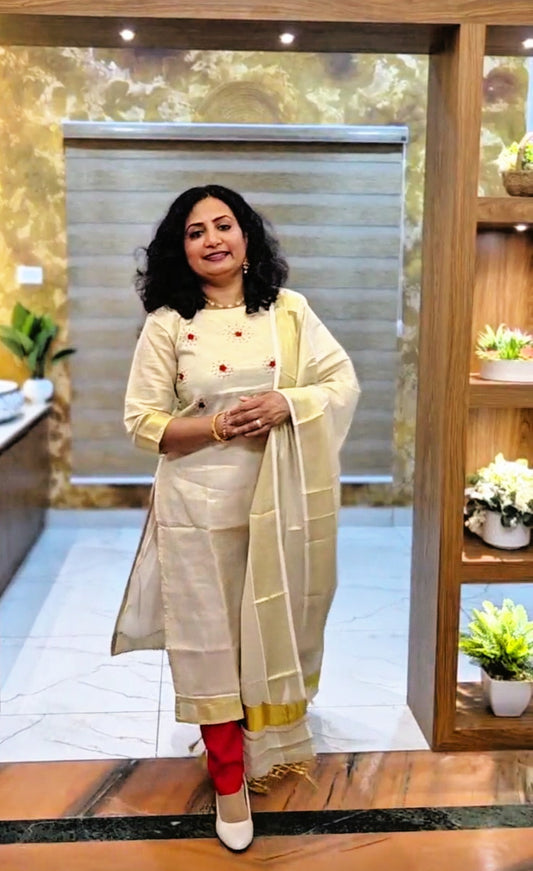 Beautiful hand worked Onam tissue three piece suit