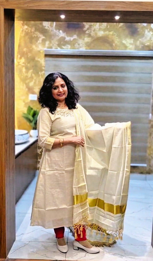 Beautiful hand worked Onam tissue three piece suit
