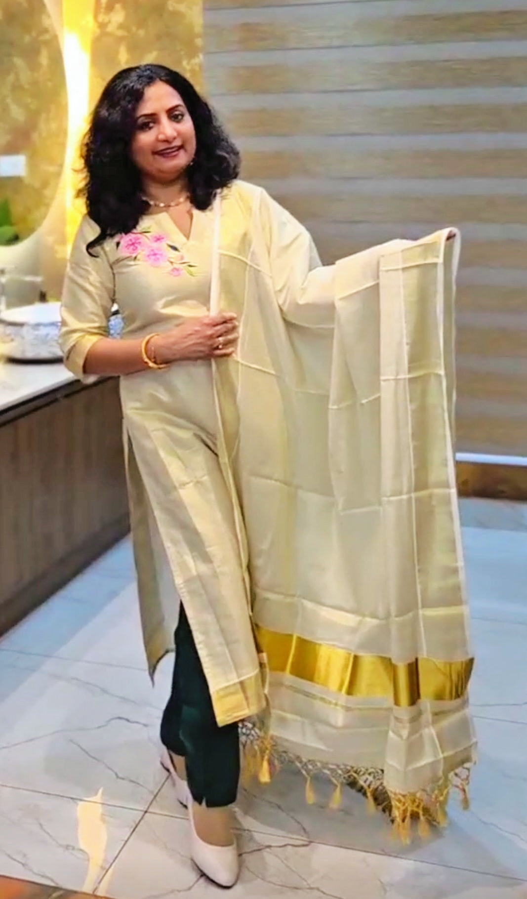 Beautiful embroidered Tissue Onam three piece suit