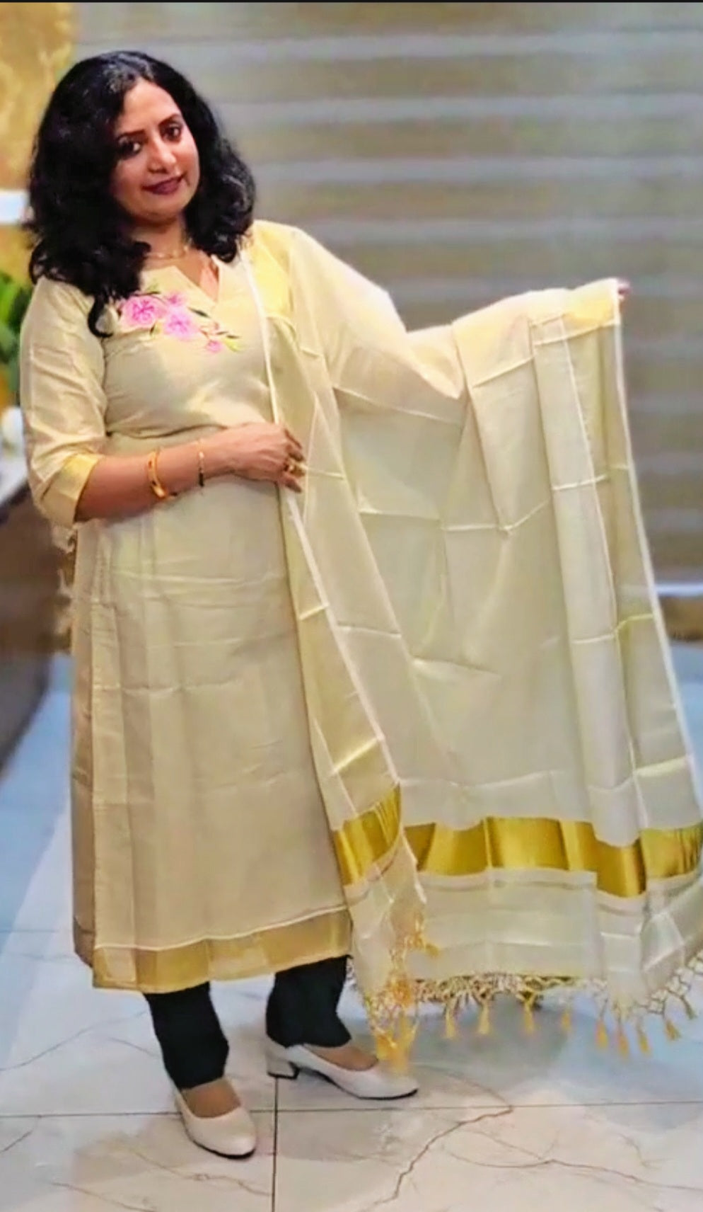 Beautiful embroidered Tissue Onam three piece suit