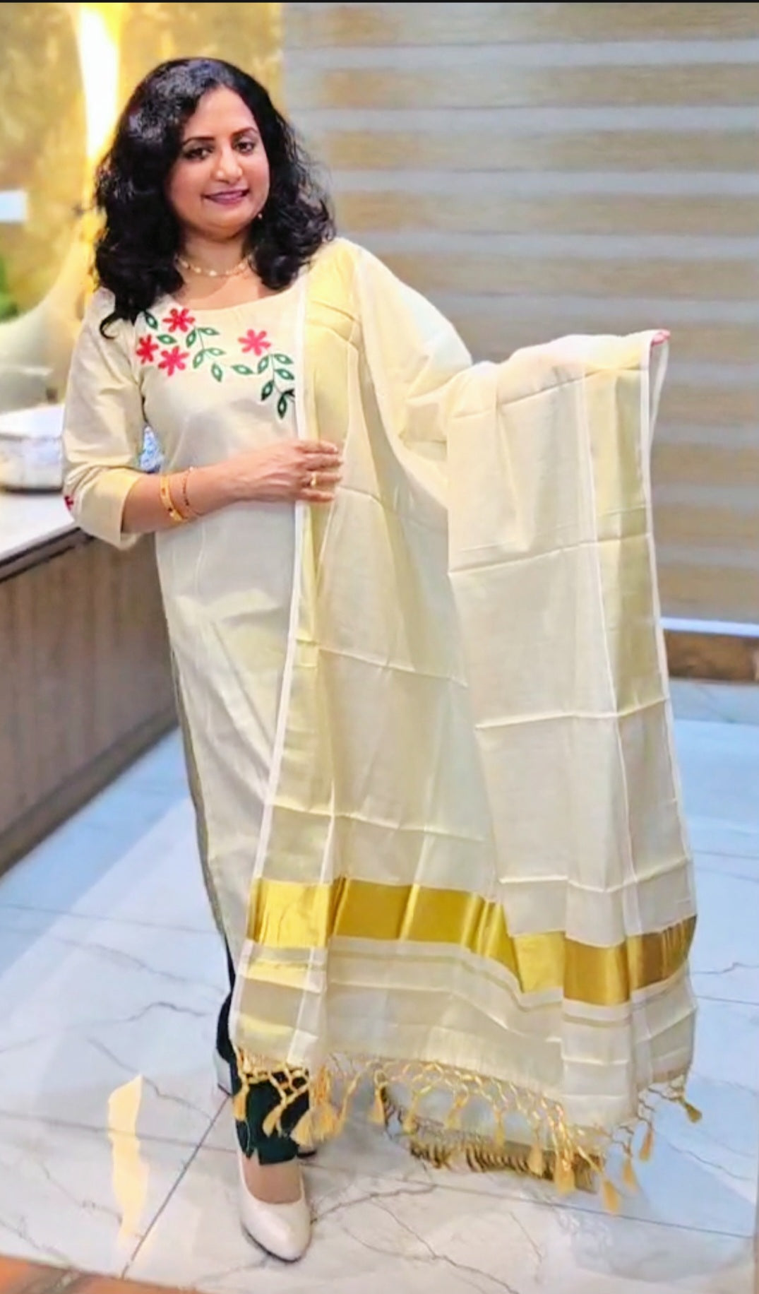 Beautiful embroidered Tissue Onam three piece suit
