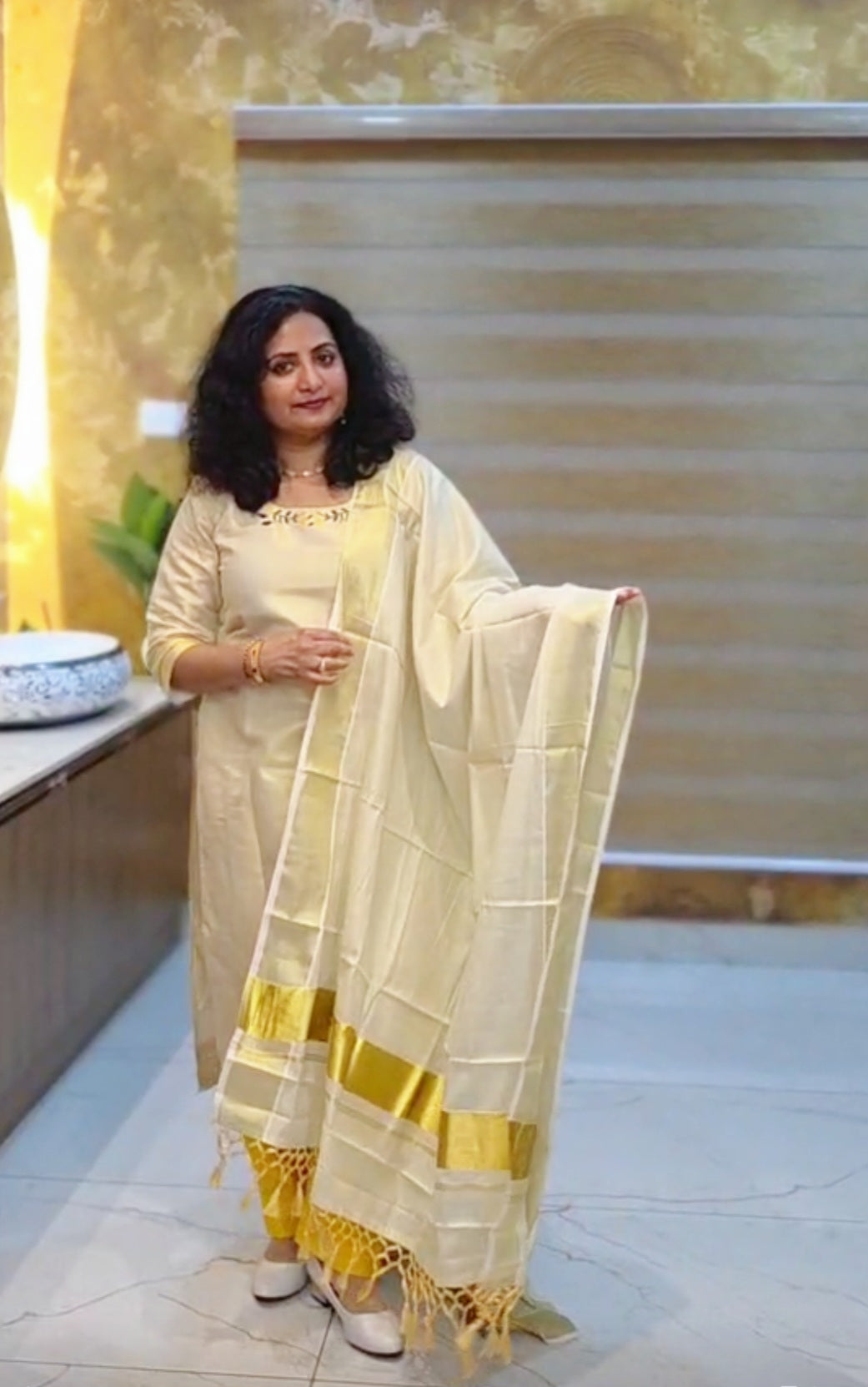 Beautiful embroidered Onam tissue three piece salwar suit