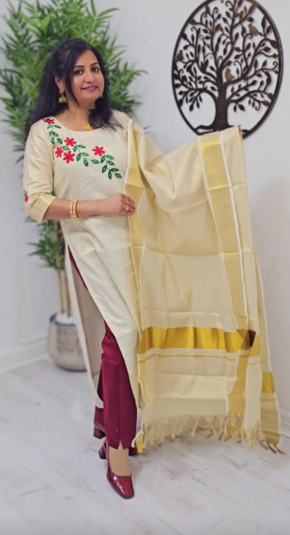 Beautiful embroidered Tissue Onam three piece suit