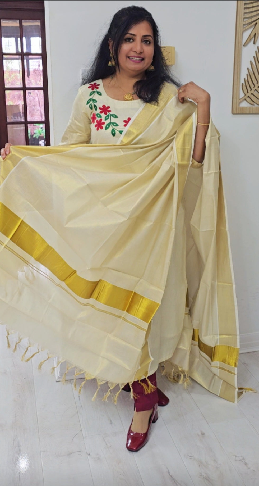 Beautiful embroidered Tissue Onam three piece suit