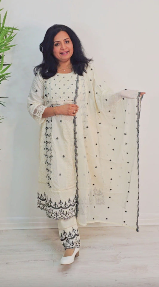 Beautiful embroidered cotton panelcut anarkali three  piece  suit