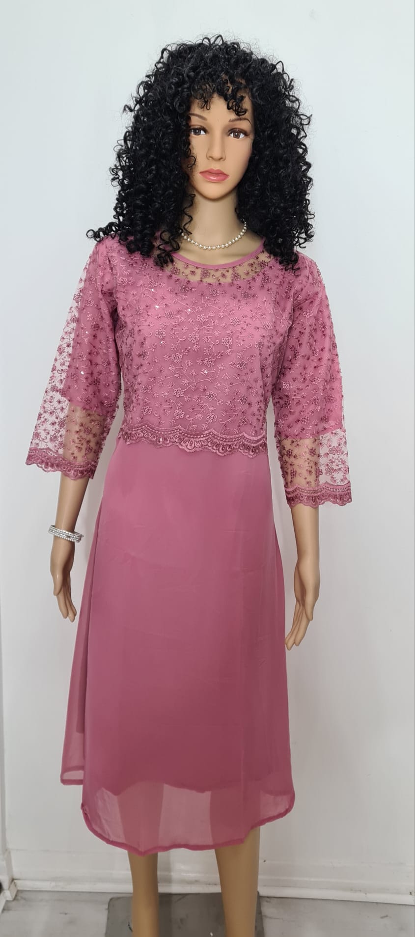 Georgette dress with lace work.